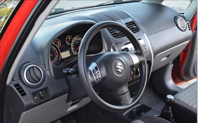 Suzuki SX4 cena 31900 przebieg: 93865, rok produkcji 2013 z Piastów małe 562
